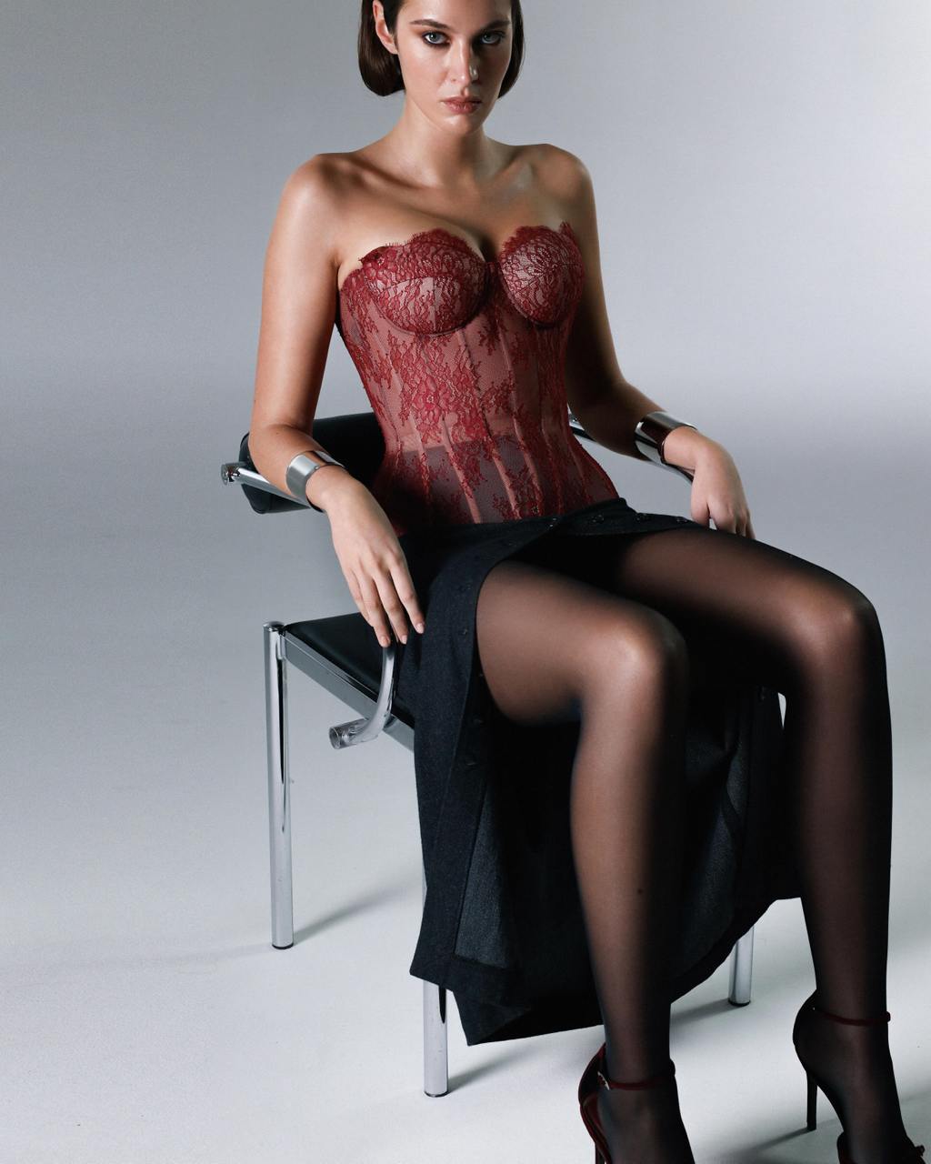 Desire drop. Lace cherry corset on beige base