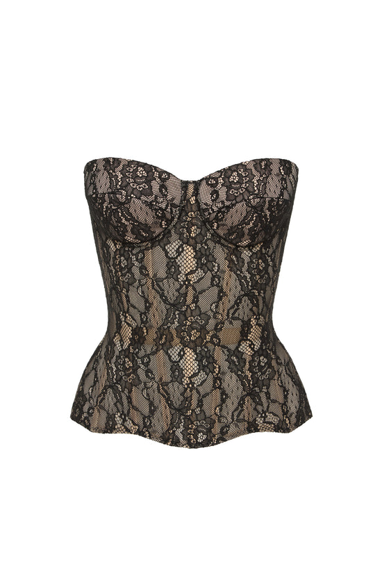 Desire drop. Lace black corset on beige base