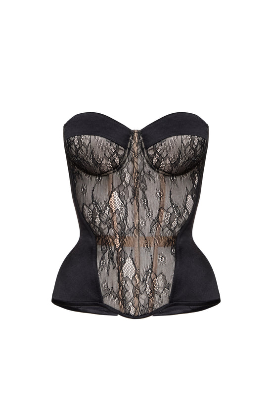 Defiance drop. A black corset with a lace front on a beige base