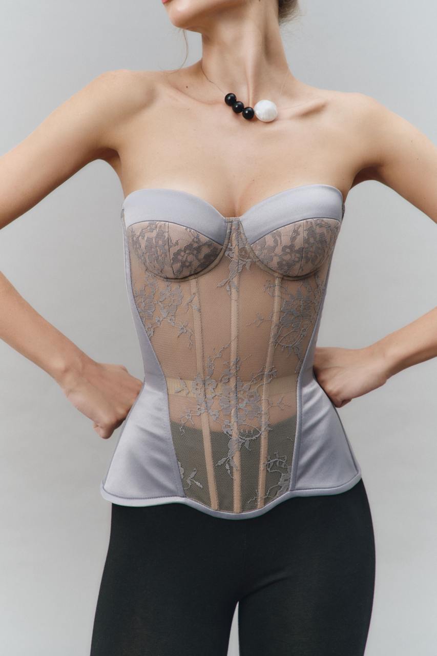 Defiance drop. A grey corset with a lace front