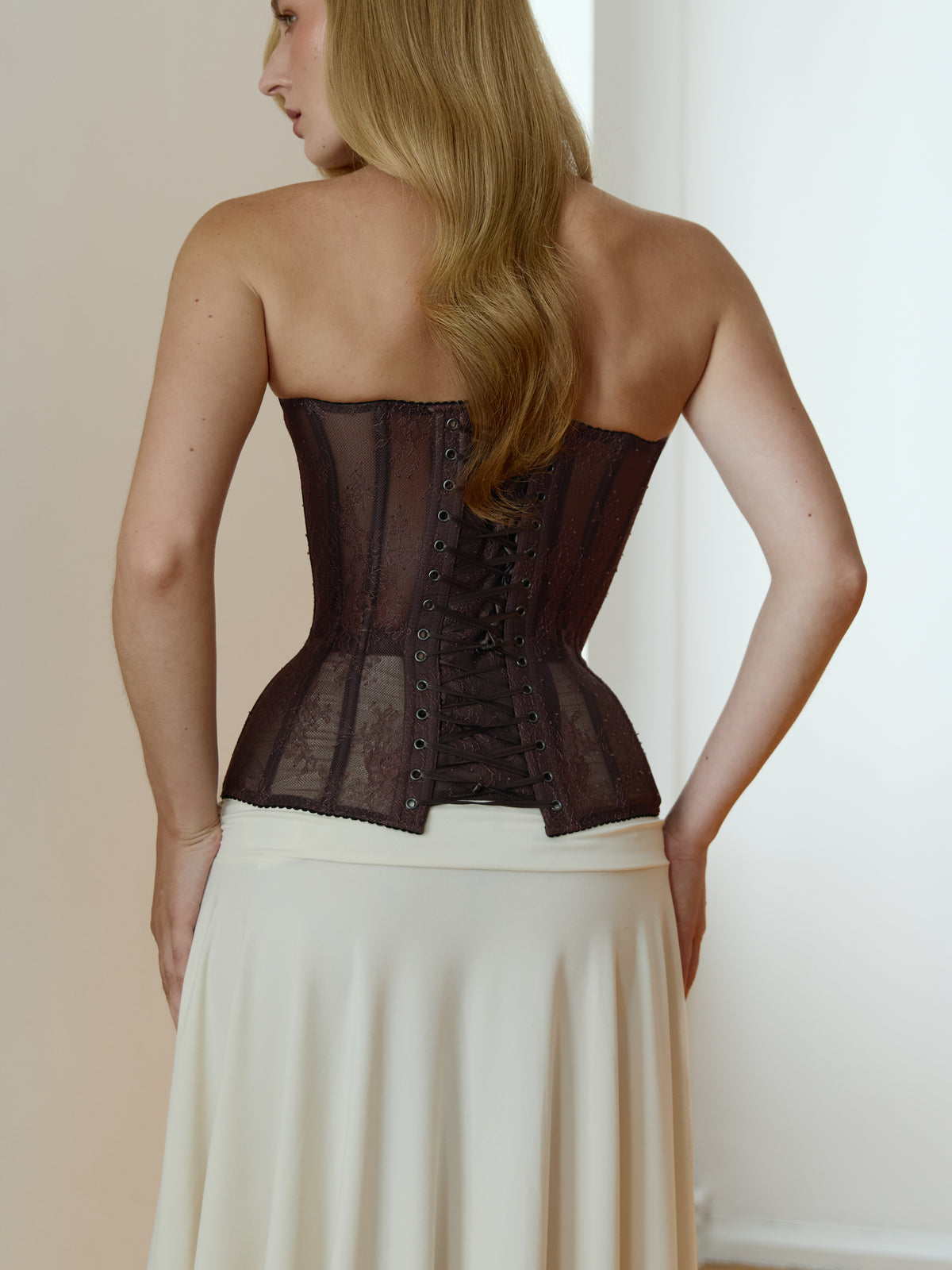 Reverie drop. Brown lace corset with a brown base